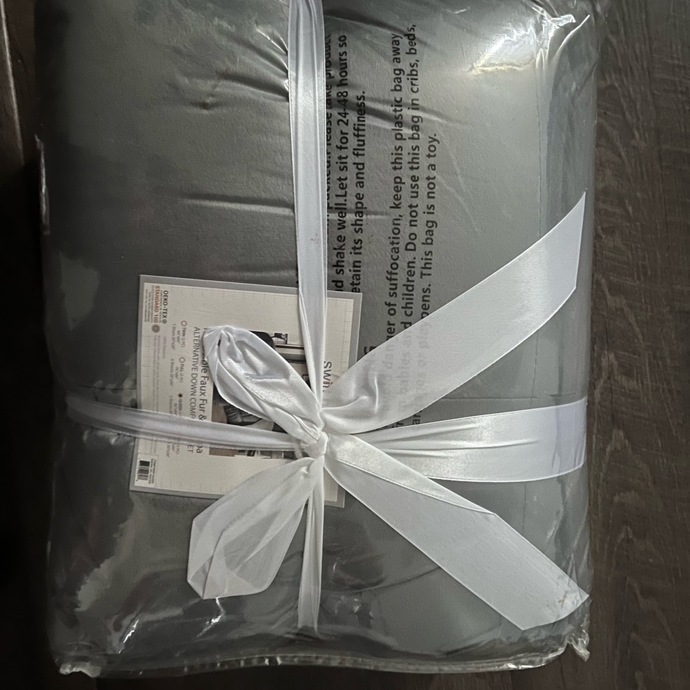 Comforter Set New in original compressed packaging
